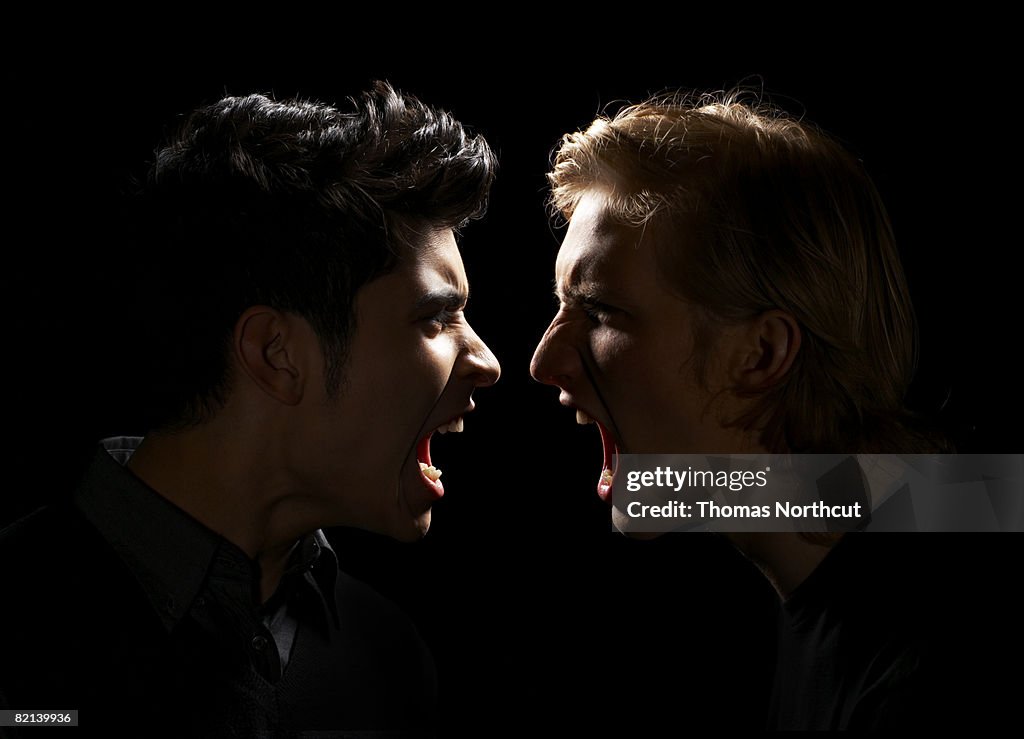 Teen Boy and Adult Male Yelling