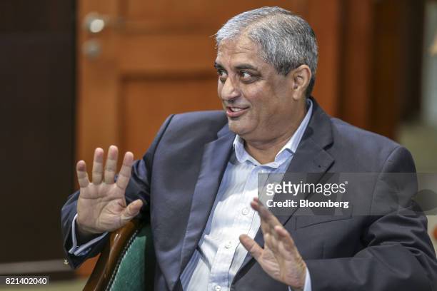 Aditya Puri, managing director of HDFC Bank Ltd., speaks during a Bloomberg Television interview in Mumbai, India, on Thursday, July 20, 2017. India...