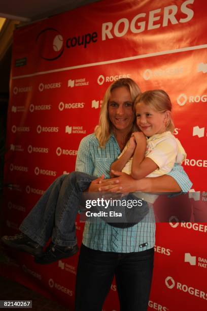 Sybille Bammer of Austria and her daughter Tina arrive for the WTA Tennis fashion show part of the Rogers Cup Tennis Tournament at the Fairmont Queen...