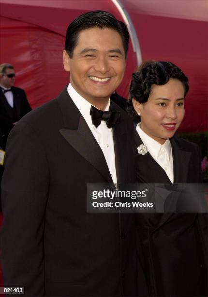 Actor Chow Yun-Fat and his wife Jasmine arrive for the 73rd Annual Academy Awards March 25, 2001 at the Shrine Auditorium in Los Angeles. Chow is...