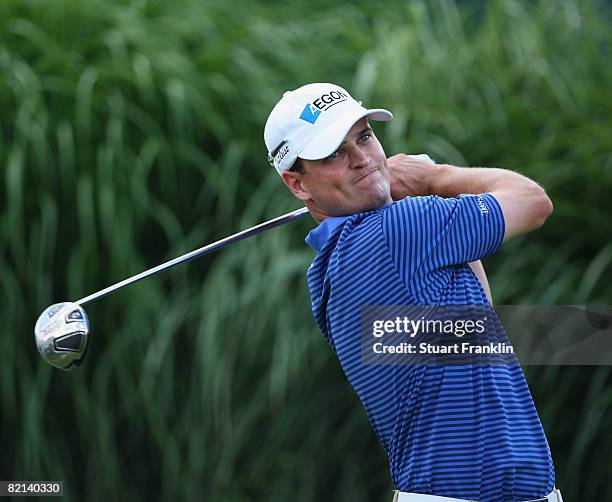 Zach Johnson of the U.S. Plays his tee shot on the 16th hole during first round of the World Golf Championship Bridgestone Invitational on July 31,...