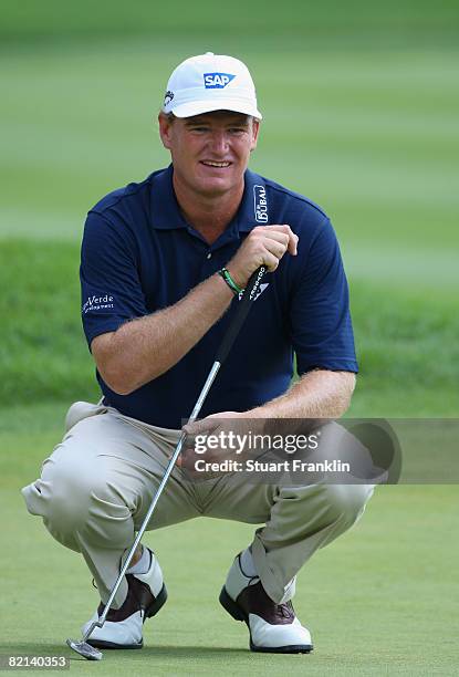 Ernie Els of South Africa lines up his putt on the 13th hole during first round of the World Golf Championship Bridgestone Invitational on July 31,...