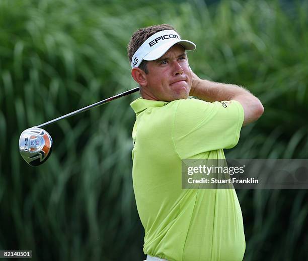 Lee Westwood of England plays his tee shot on the 16th hole during first round of the World Golf Championship Bridgestone Invitational on July 31,...