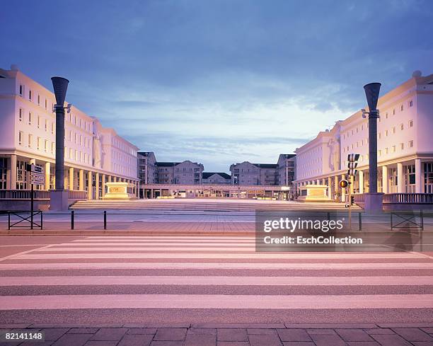 morning image of a town center with shops in neo-classical style. - kmart and shop your way celebrate launch of nicki minaj collection stockfoto's en -beelden