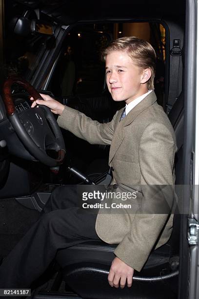 Haley Joel Osment sits behind the wheel of a new Mercedes-Benz