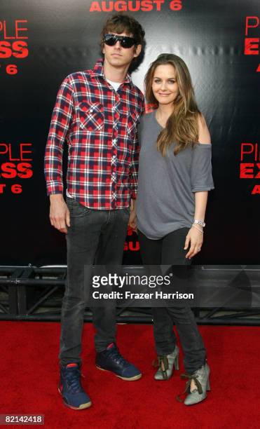 Musician Christopher Jarecki and Alicia Silverstone, arrive at the Premiere Of Columbia Pictures' "Pineapple Express" on July 31, 2008 at the Mann...