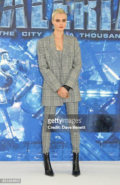 Cara Delevingne attends a photocall for "Valerian And The City Of A Thousand Planets" at The Langham Hotel on July 24, 2017 in London, England.
