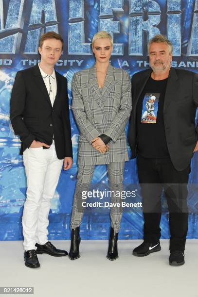 Dane DeHaan, Cara Delevingne and director Luc Besson attend a photocall for "Valerian And The City Of A Thousand Planets" at The Langham Hotel on...