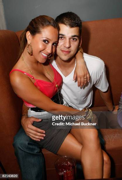 Singer Adrienne Bailon and male model Robert Kardashian attend the "Maxim Celebrates the Biggest Event in Extreme Sports" at the Stork on July 31,...