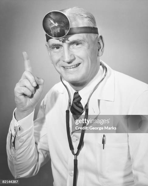 mature doctor pointing, (b&w), portrait - w hand sign stock pictures, royalty-free photos & images