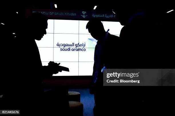 Saudi Arabian Oil Co. Logo sits on an electronic display at the company's corporate pavilion during the 22nd World Petroleum Congress in Istanbul,...