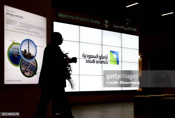 Saudi Arabian Oil Co. Logo sits on an electronic display at the company's corporate pavilion during the 22nd World Petroleum Congress in Istanbul,...