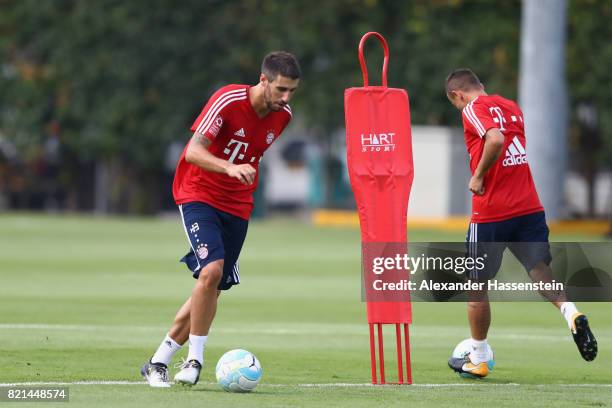 Javier Martinez of Muenchen runs with the ball during a training session at Geylang Field during the Audi Summer Tour 2017 on July 24, 2017 in...