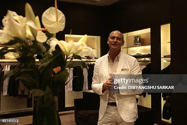 Merchandising Manager of Designer clothing group Ermengildo Zegna, Stefano Miglio gestures during the launch of the brand in Bangalore August 1,...