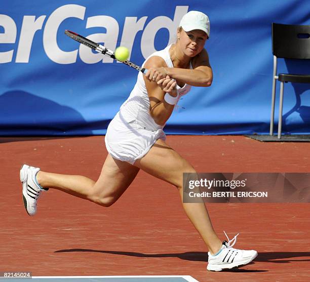Vera Dushevina of Russia returns a shot to Iveta Benesova of the Czech Republic during their Nordic Light tennis tournament quarterfinal on August 1...