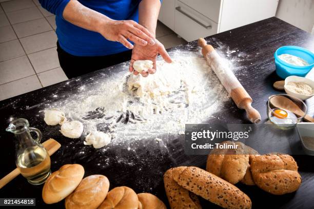 preparing bread dough - grainy bread stock pictures, royalty-free photos & images