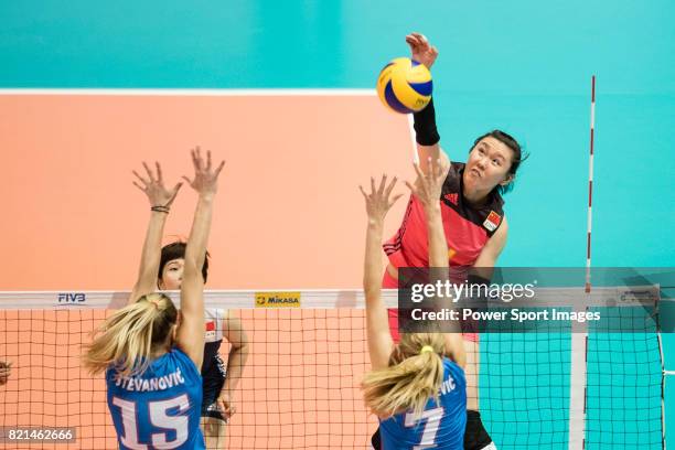 Opposite spiker Jingwen Qian of China spikes the ball during the FIVB Volleyball World Grand Prix match between China vs Serbia on July 23, 2017 in...