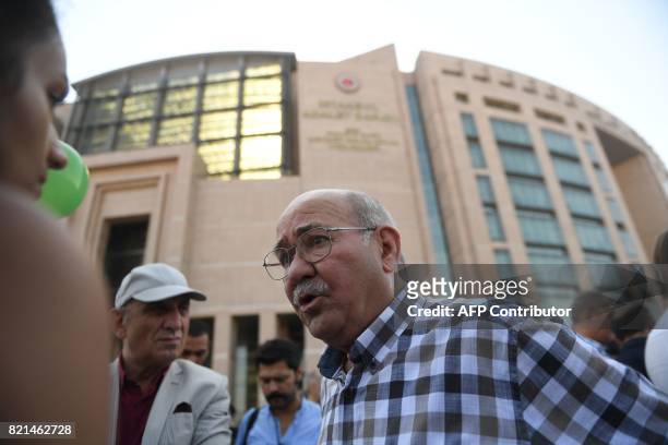 Writer for Turkish daily newspaper Cumhuriyet, Aydin Engin, speaks to AFP during a demonstration on July 24, 2017 outside Istanbul's courthouse,...