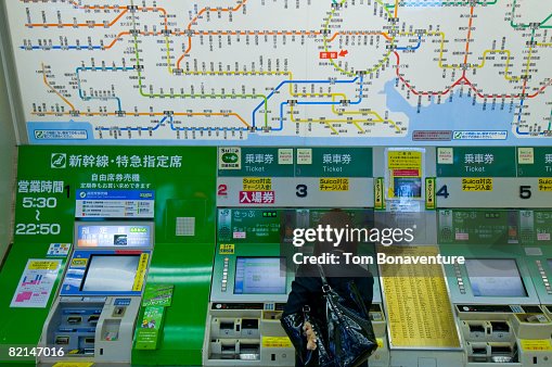 Girl at ticket machine Shibuya Tokyo Girl at ticket machine Shibuya Tokyo