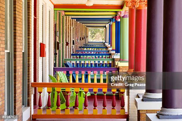 multi-colored rowhouse porches - baltimore maryland stock-fotos und bilder