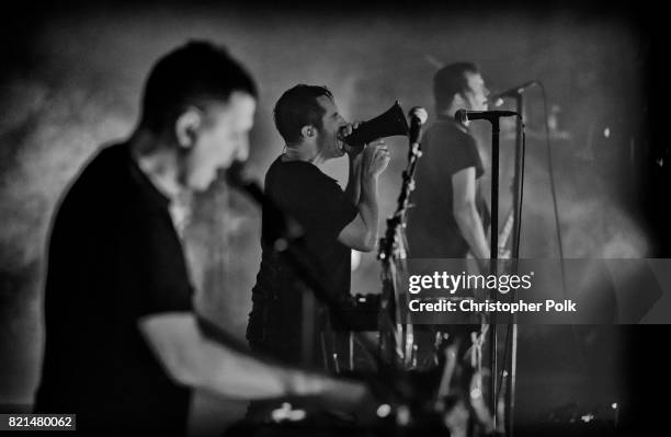 Atticus Ross and Trent Reznor and Robin Finck of Nine Inch Nails perform onstage on day 3 of FYF Fest 2017 at Exposition Park on July 23, 2017 in Los...
