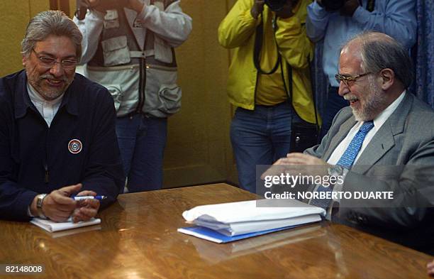 Paraguay's President elect Fernando Lugo jokes with Brazil's Special Advisor on Foreign Policies Marco Aurelio Garcia on August 1st, 2008 in...