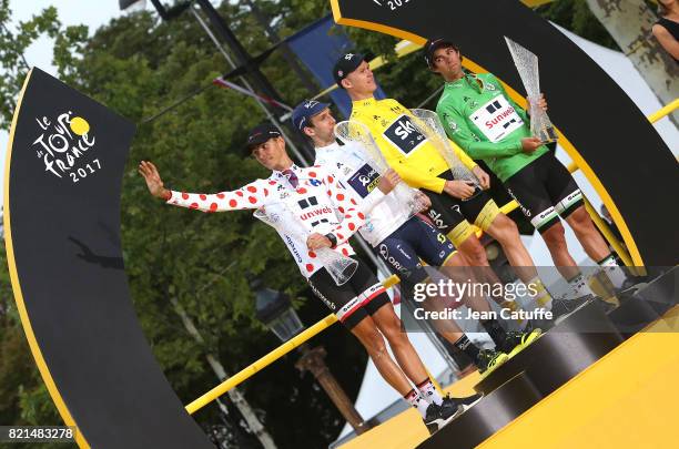 Best climber Warren Barguil of France and Team Sunweb, best young rider Simon Yates of Great Britain and Orica-Scott, winner Christopher Froome of...