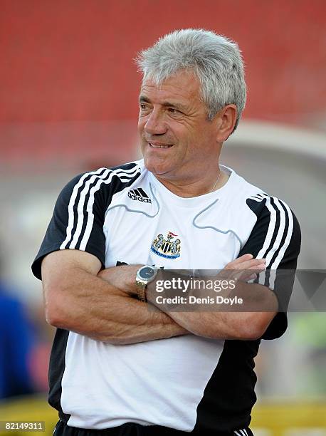 Newcastle United's manager Kevin Keegan watches his side warm-up before the pre-season friendly match between Hertha Berlin and Newcastle United at...