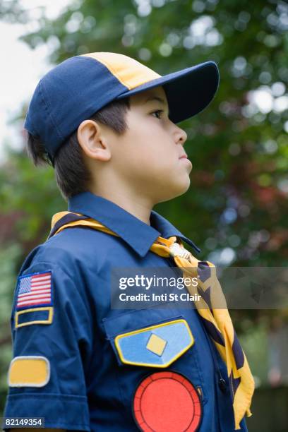 asian boy wearing uniform - scouts honour stock pictures, royalty-free photos & images