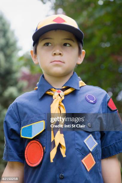 asian boy wearing uniform - pfadfinder stock-fotos und bilder