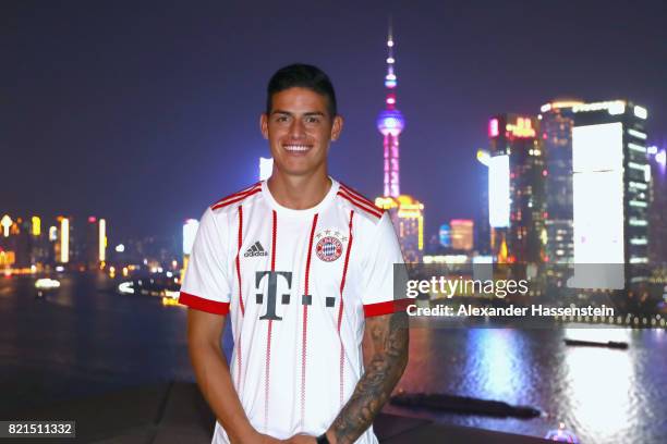James Rodriguez of FC Bayern Muenchen poses for a picture with the Shanghai Bund in the background during the Audi Night 2017 at Wanda Reign Hotel...