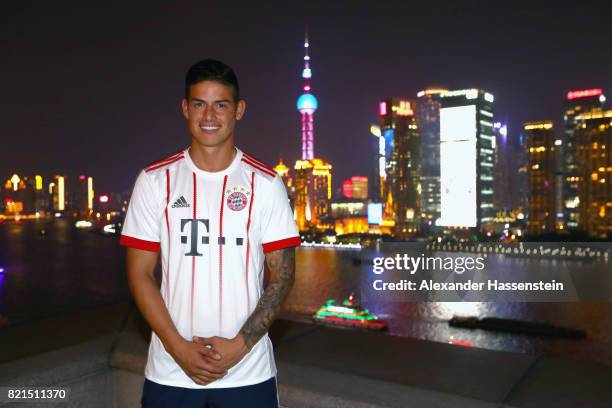 James Rodriguez of FC Bayern Muenchen poses for a picture with the Shanghai Bund in the background during the Audi Night 2017 at Wanda Reign Hotel...