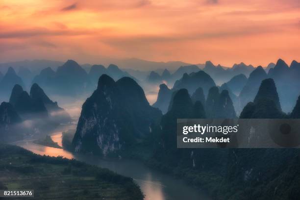 the dawn at xianggang hill, the famous viewpoint of guilin, china - asia village river stock pictures, royalty-free photos & images