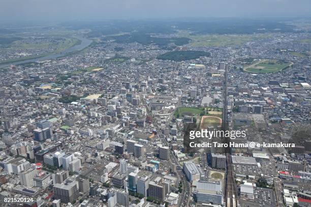 miyazaki city in miyazaki prefecture daytime aerial view from airplane - miyazaki prefecture stock pictures, royalty-free photos & images