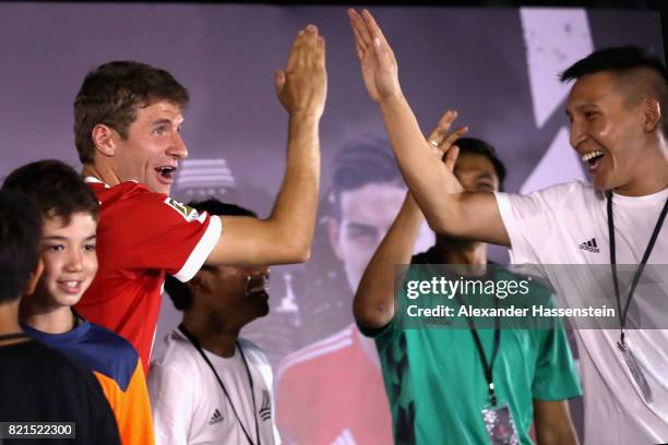 Thomas Mueller of FC Bayern Muenchen attends a adidas marketing event at Clifford square during the Audi Summer Tour 2017 on July 24, 2017 in...