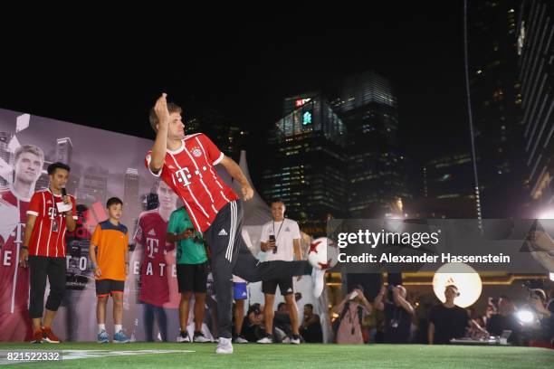 Thomas Mueller of FC Bayern Muenchen shwo football skills during a adidas marketing event at Clifford square during the Audi Summer Tour 2017 on July...