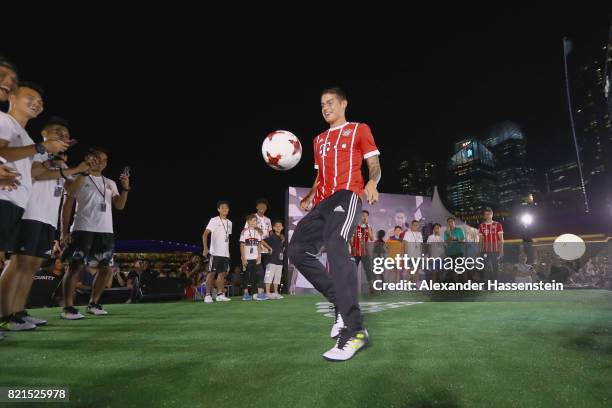 James Rodriguez of FC Bayern Muenchen shwo football skills during a adidas marketing event at Clifford square during the Audi Summer Tour 2017 on...