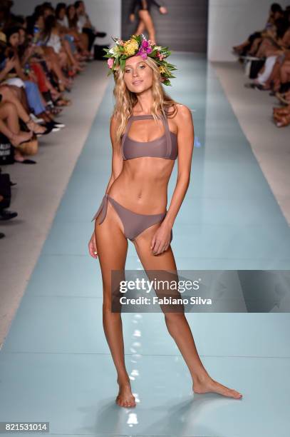 Model walks the runway at the Issa De'Mar Runway at FUNKSHION Swim Fashion Week at Funkshion Tent on July 23, 2017 in Miami Beach, Florida.