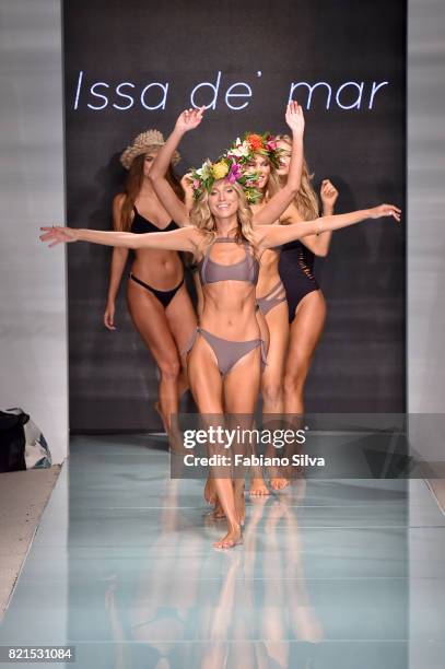 Models walk the runway at the Issa De'Mar Runway at FUNKSHION Swim Fashion Week at Funkshion Tent on July 23, 2017 in Miami Beach, Florida.