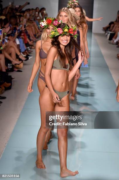Models walk the runway at the Issa De'Mar Runway at FUNKSHION Swim Fashion Week at Funkshion Tent on July 23, 2017 in Miami Beach, Florida.