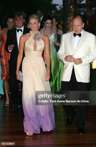 Prince Albert II of Monaco and Charlene Wittstock attend the 60th Monaco Red Cross Ball at the Monte-Carlo Sporting Club on August 1, 2008 in Monte...