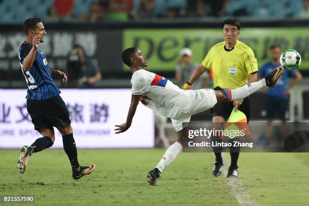 Myziane Maolida of Olympique Lyonnais competes for the ball with Danilo D'Ambrosio of FC Internationale during the 2017 International Champions Cup...