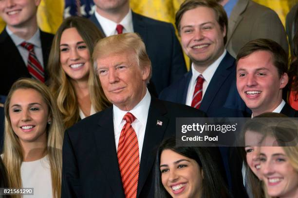 President Donald J. Trump poses for photographs with an outgoing group of interns at The White House July 24, 2017 in Washington, DC.