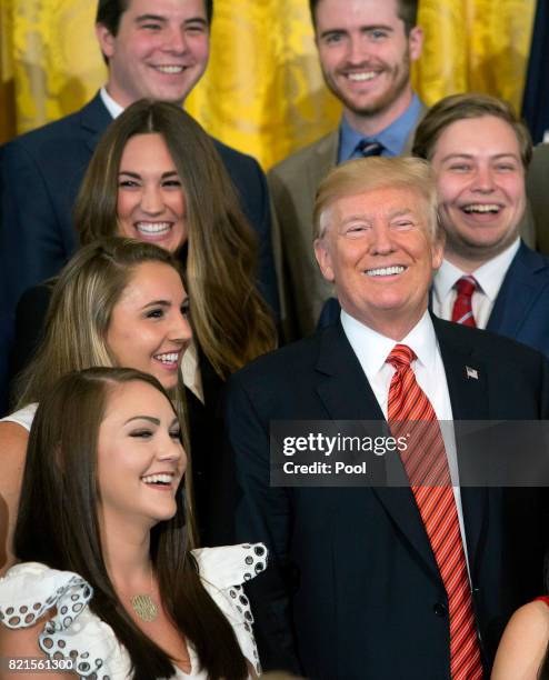 President Donald J. Trump poses for photographs with an outgoing group of interns at The White House July 24, 2017 in Washington, DC.