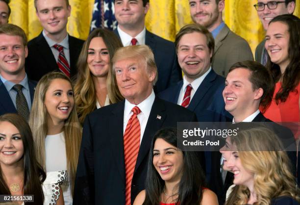 President Donald J. Trump poses for photographs with an outgoing group of interns at The White House July 24, 2017 in Washington, DC.