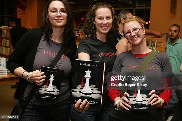Fans/customers purchase the fourth book, 'Breaking Dawn' in the 'Twilight' series at the 'Breaking Dawn' Midnight Release Party at Borders, Michigan...