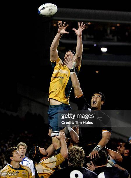 Daniel Vickerman of the Wallabies wins a lineout from Jerome Kaino of the All Blacks during the 2008 Tri Nations series Bledisloe Cup match between...