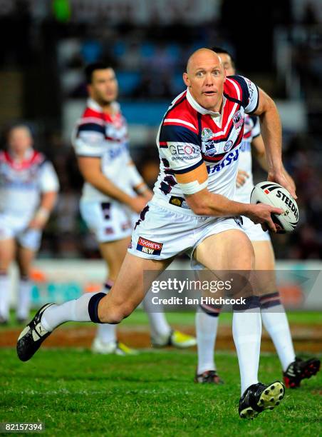 Craig Fitzgibbon of the Roosters runs the ball during the round 21 NRL match between the North Queensland Cowboys and the Sydney Roosters at Dairy...