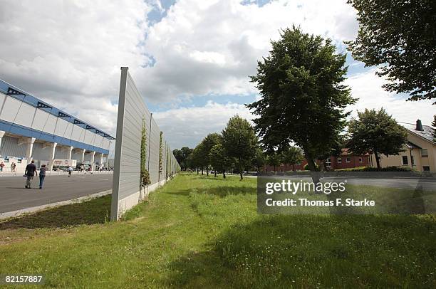 Noise protection wall is seen between the stadium and the residents houses ahead of the 3. Bundesliga match between SC Paderborn and SpVgg...