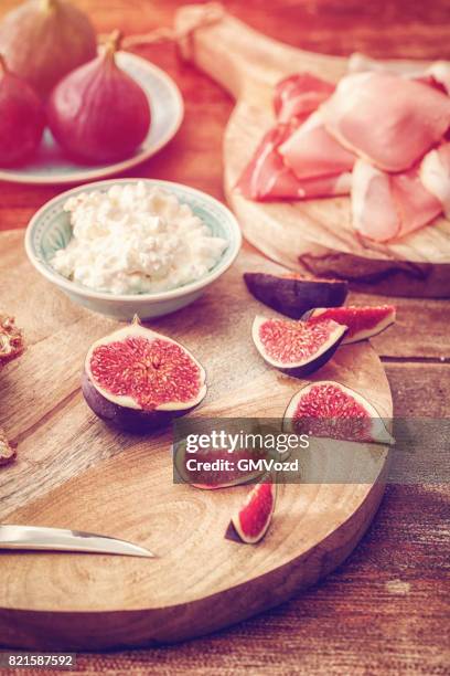 crispbread with serrano ham, cottage cheese, and figs - knäckebrot stock pictures, royalty-free photos & images